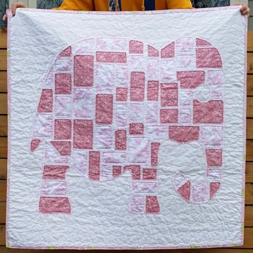 Ticker-Tape Elephant Baby Quilt Wall Hanging by Jen Eskridge in Scrap Happy Quilting an Annie’s Quilting publication